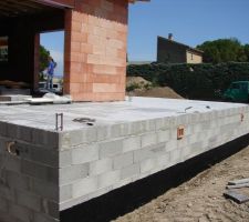 Passage du bitume là où on mettra la terre