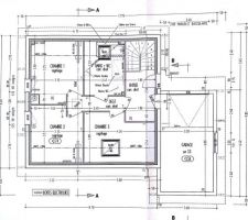 Garage en demi-niveau à hauteur sol et étage