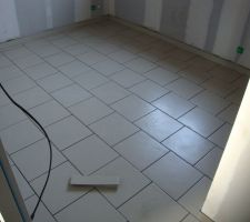 Carrelage dans une des chambres