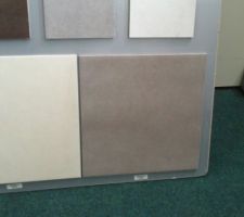 Nous avons &eacute;t&eacute; choisir le carrelage
taupe pour sdb