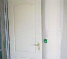 Détail porte chambre avant.