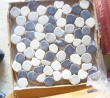 Les galets du sol de la douche italienne