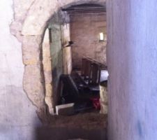 Ouverture de la porte voutée qui avait été fermée dans le temps