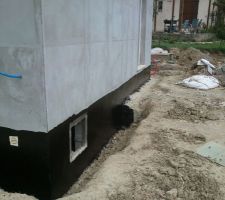 Pose de l'enduit avant le drain