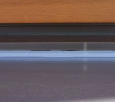 Joints au bas des baies vitrées, étanchéité, travail esthétique...