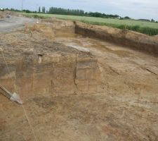 Bassin d'infiltration sous l'espace vert