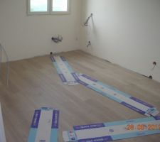 Le parquet flottant de la chambre d'amis