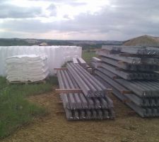 Livraison des longrines,poutrelles,marmites.