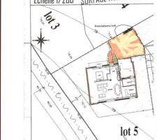 Voici le projet d'aménagement pour les places de stationnement, qui justifie la porte de service coté Est du garage;