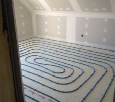 Mise en place plancher chauffant