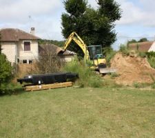 Enlevement de la terre provenant des fouilles et du vide sanitaire.