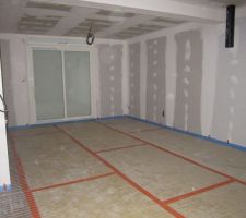 Pose de l'isolant pour la chape