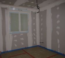 Pose de l'isolant pour la chape