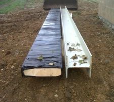 Poutre acier HEA 290x320 et poutre en bois 520x140.
Une pour le toit principal et l'autre le toit du garage.