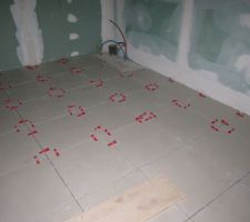 Pose du carrelage du rdc avec cales rls