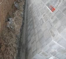 J46_Socle drain (mur ouest) pente sur 14.5 m