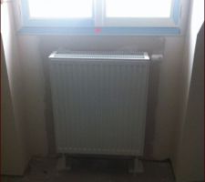 Pose des radiateur à eau à l'étage