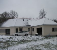 Maison sous la neige
