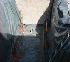 Pr&eacute;paration de la dalle et poteau de la fosse