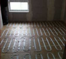 Plancher chauffant chambre parentale