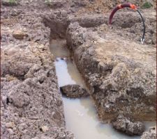 Un peu d'eau dans les fouilles, appréhension sur le moment mais après lecture des avis (souvent très pros) du forum, pas de souci.