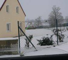 Maison sous la neige