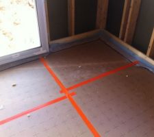 Pose de l'isolant du sol avant chape finale