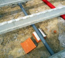 Positionnement des évacuations dans le vide sanitaire