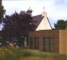 Plan en situation de l'extension en bois, toit plat, proposée par extenbois. Simulation. axe Est-Sud.
