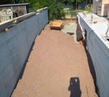 Pr&eacute;paratifs pour la descente de garage.