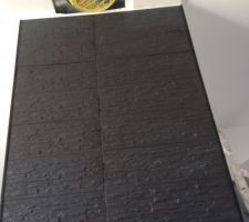 Mur de pierre pour le poele