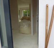 Isolant projeté au sol