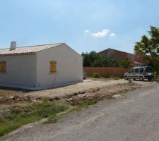 Remise en place des terres et tranchée pour mur de cloture