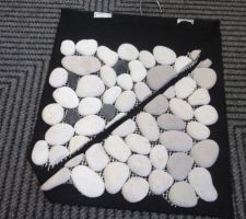 Galet (ceux de gauche) pour douche italienne