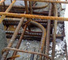 Intersection poutre principale et chainage du mur de parpaing qui separe le garage du salon