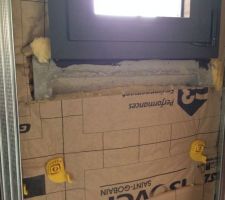 Le doublage des murs extérieurs en cours. Système Optima.