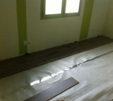 Pose du parquet dans la chambre parentale