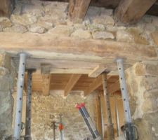 Remplacement d'une poutre qui était trop basse par un poutre de récupération