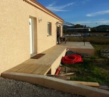 ENDUIT SUR MURET DU GARAGE ET POSE SOL DEMONTABLE ENTRE LE GARAGE ET LA TERRASSE