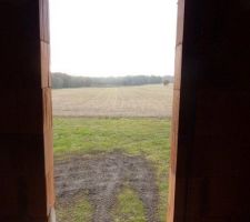 Vue porte fenêtre chambre 01