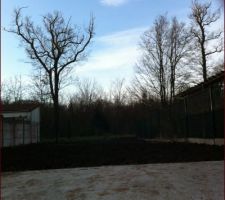 Ajout de terre 30m3 pour égaliser le terrain derrière la future maison