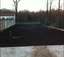 Ajout de terre 30m3 pour égaliser le terrain derrière la future maison