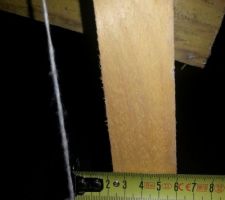 Pas loin de 30 mm pour 1 m de hauteur...