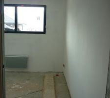 Première couche d'enduit pour le ratissage