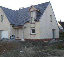 Soubassement en briquettes en cours