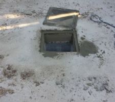 Plaque d'acc&egrave;s au puisard retravaill&eacute;e pour eviter qu'elle ne bouge d&egrave;s qu'on roulera dessus