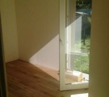 Pose du parquet dans la chambre arrière